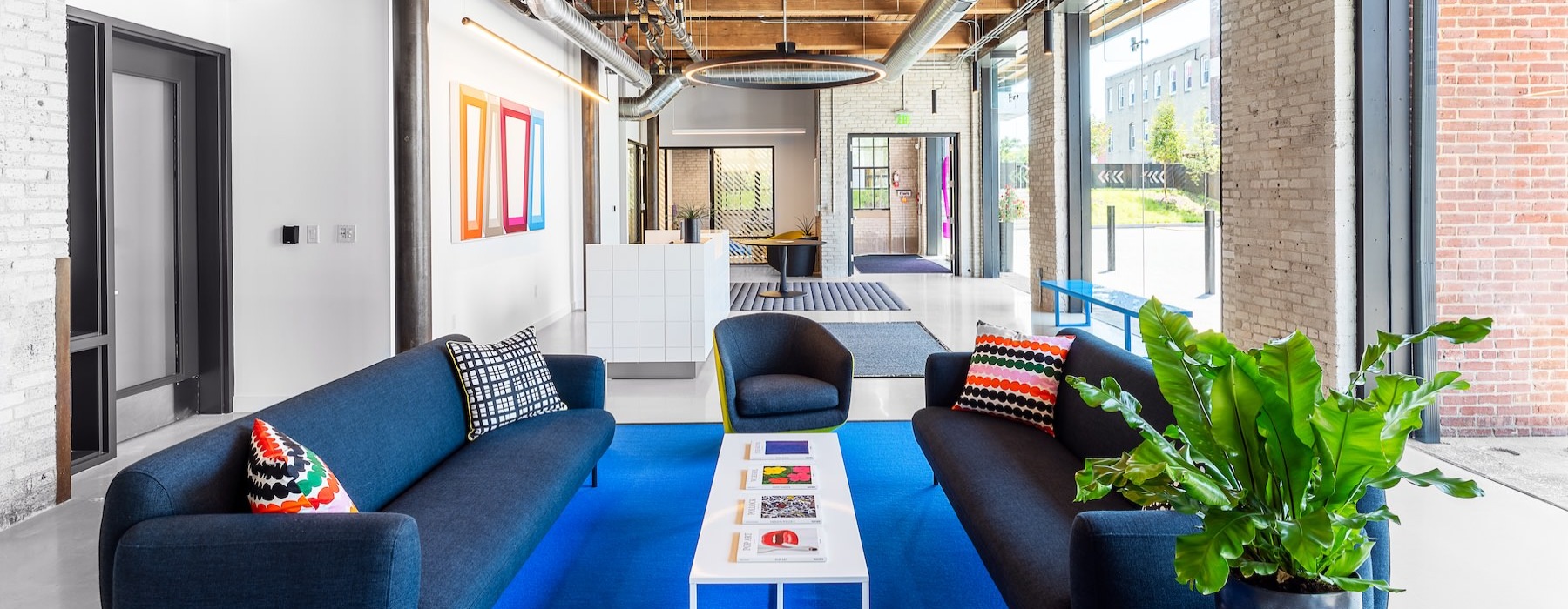 a clubroom with couches and a table